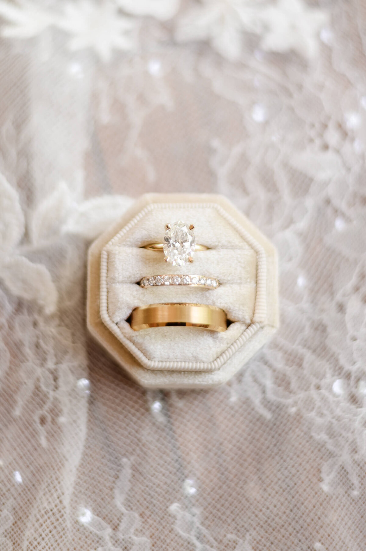 Wedding rings in a velvet box on wedding dress train captured by Pittsburgh photographer Bree Stewart of LLP.
