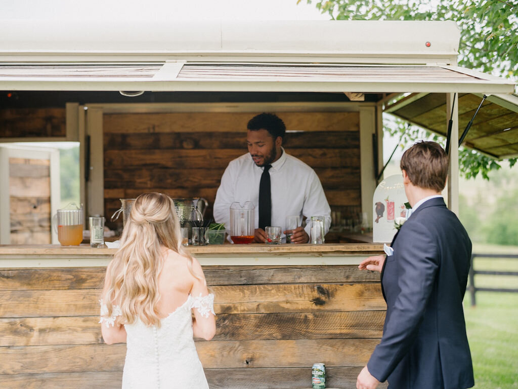 Bride and groom in a bar station