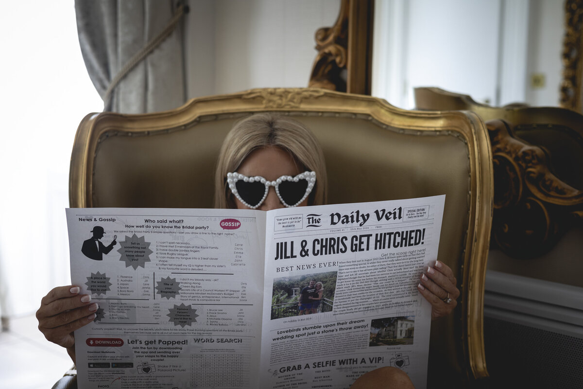 Jill reading her Wedding Newspaper