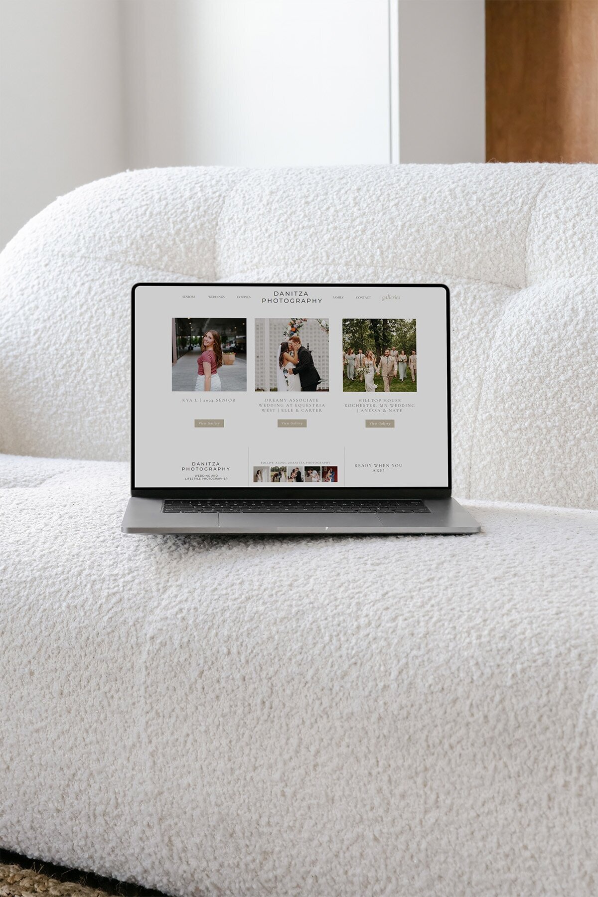 laptop-couch-wedding-photographer-website