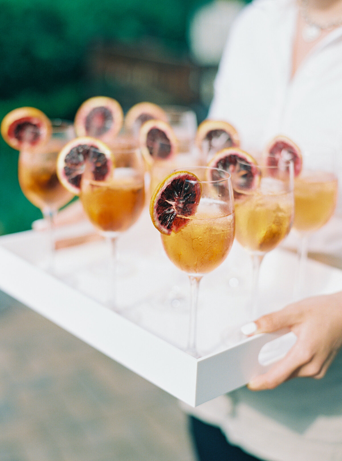 Blood orange cocktails at spring wedding in Charleston. Charleston destination wedding photographer.