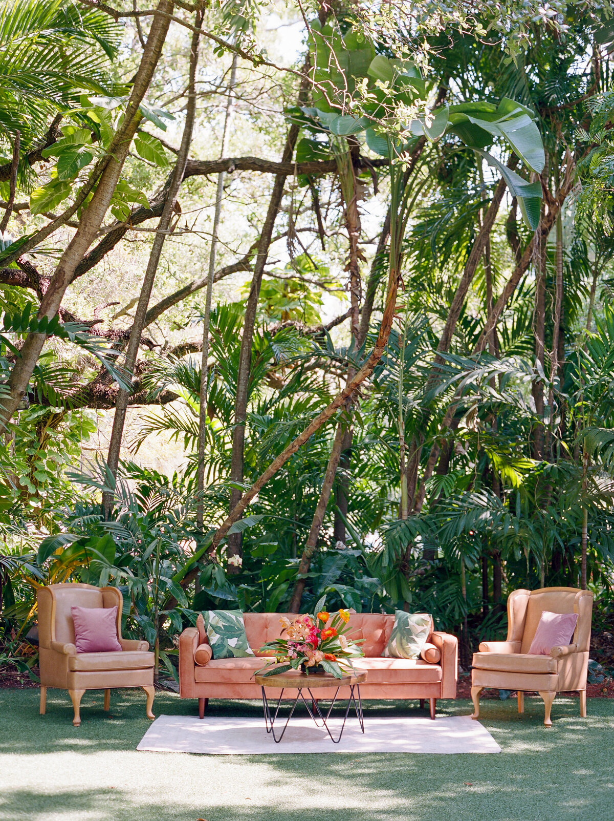 A livingroom in the middle of a yard.
