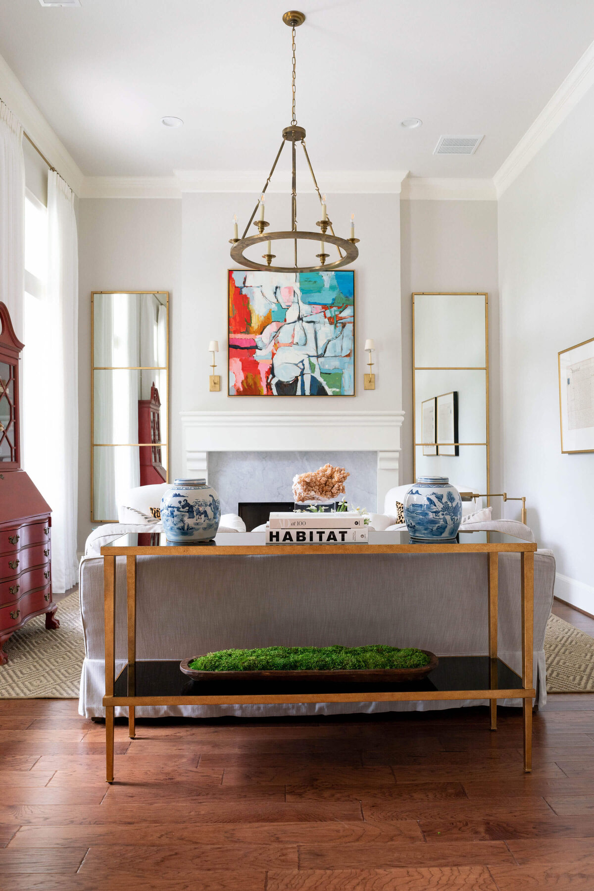 oyster creek studios heathcott abstract artowrk in living room with fireplace