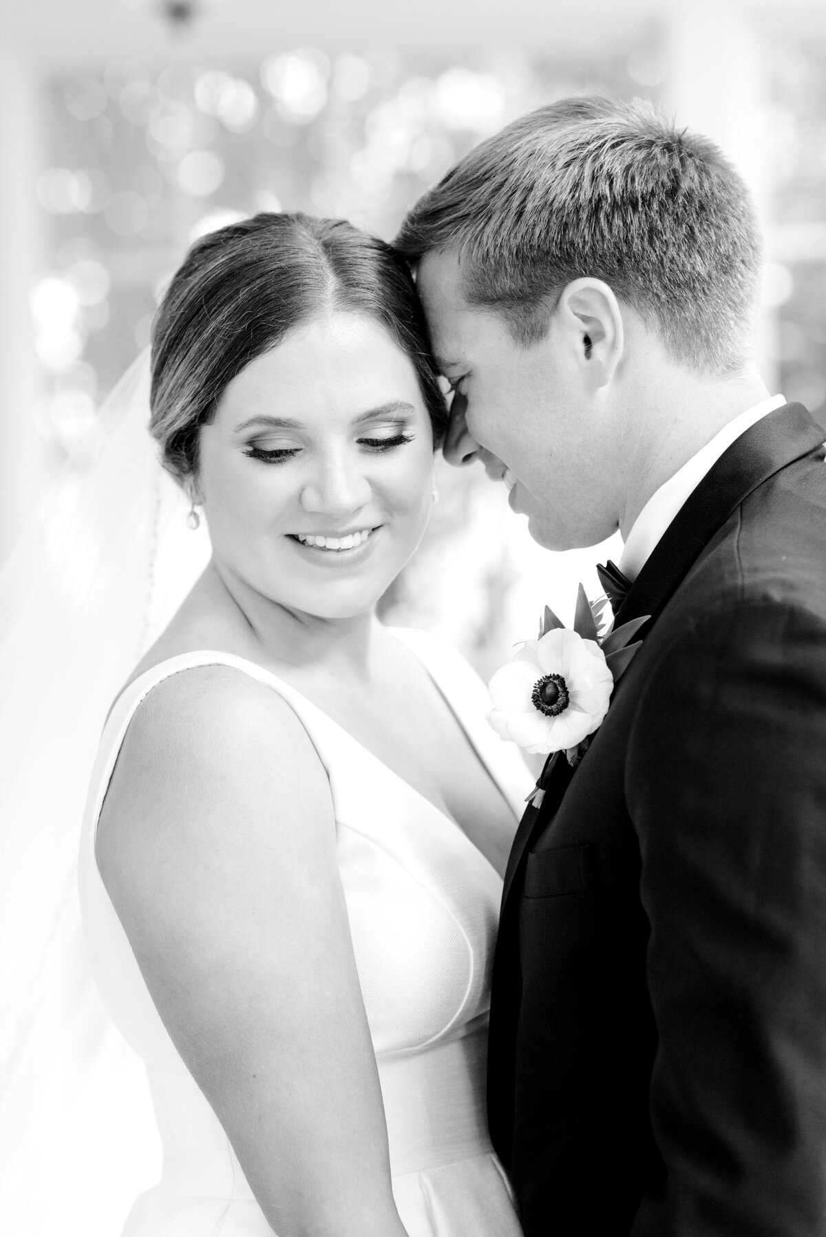 black and white portrait of bride and groom