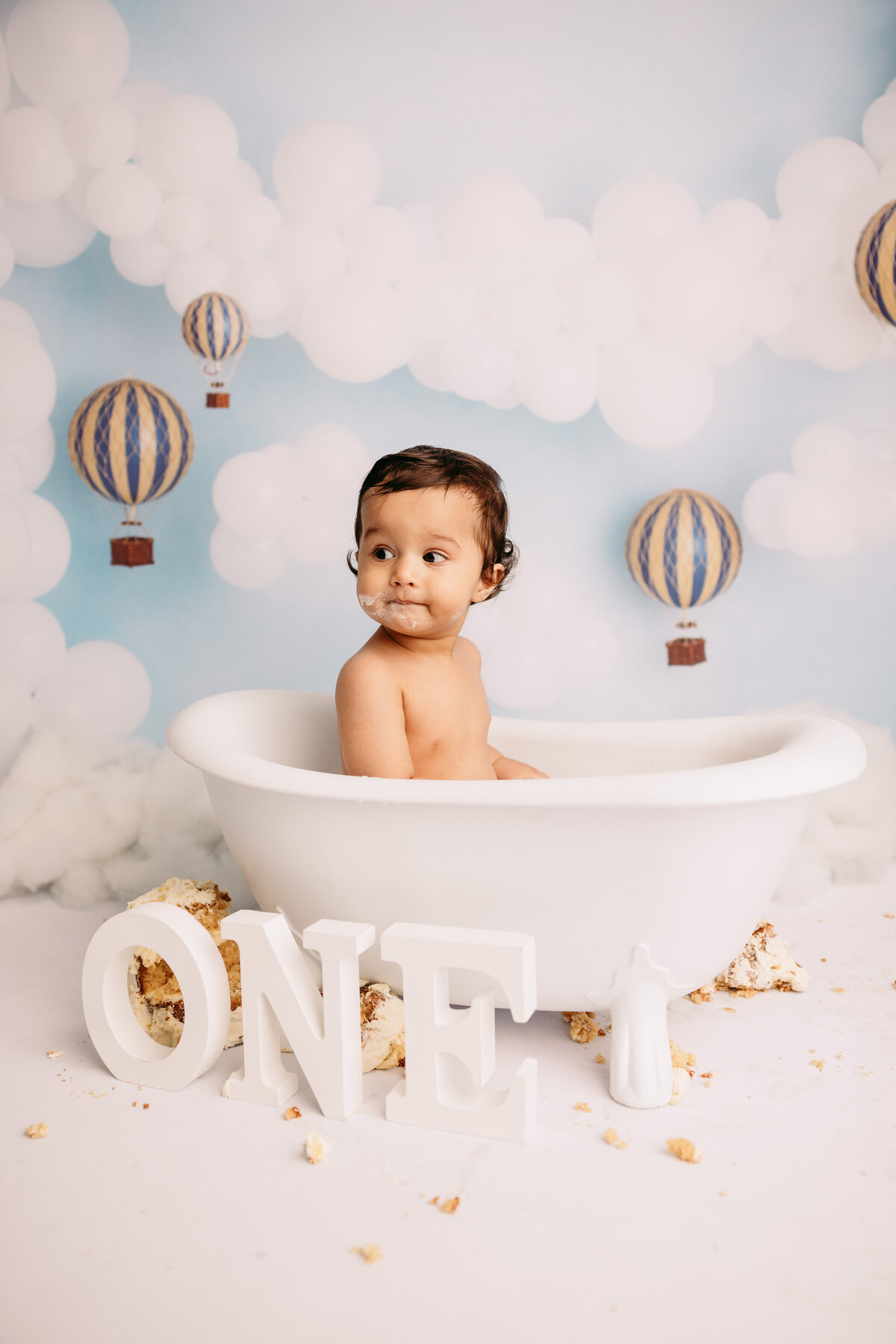 Saif with his cake and bath during his photoshoot with auckland photographer michelle kelly