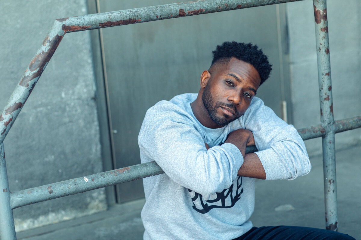 Portrait Photo Of Young Black Man With His Arms Crossed Los Angeles