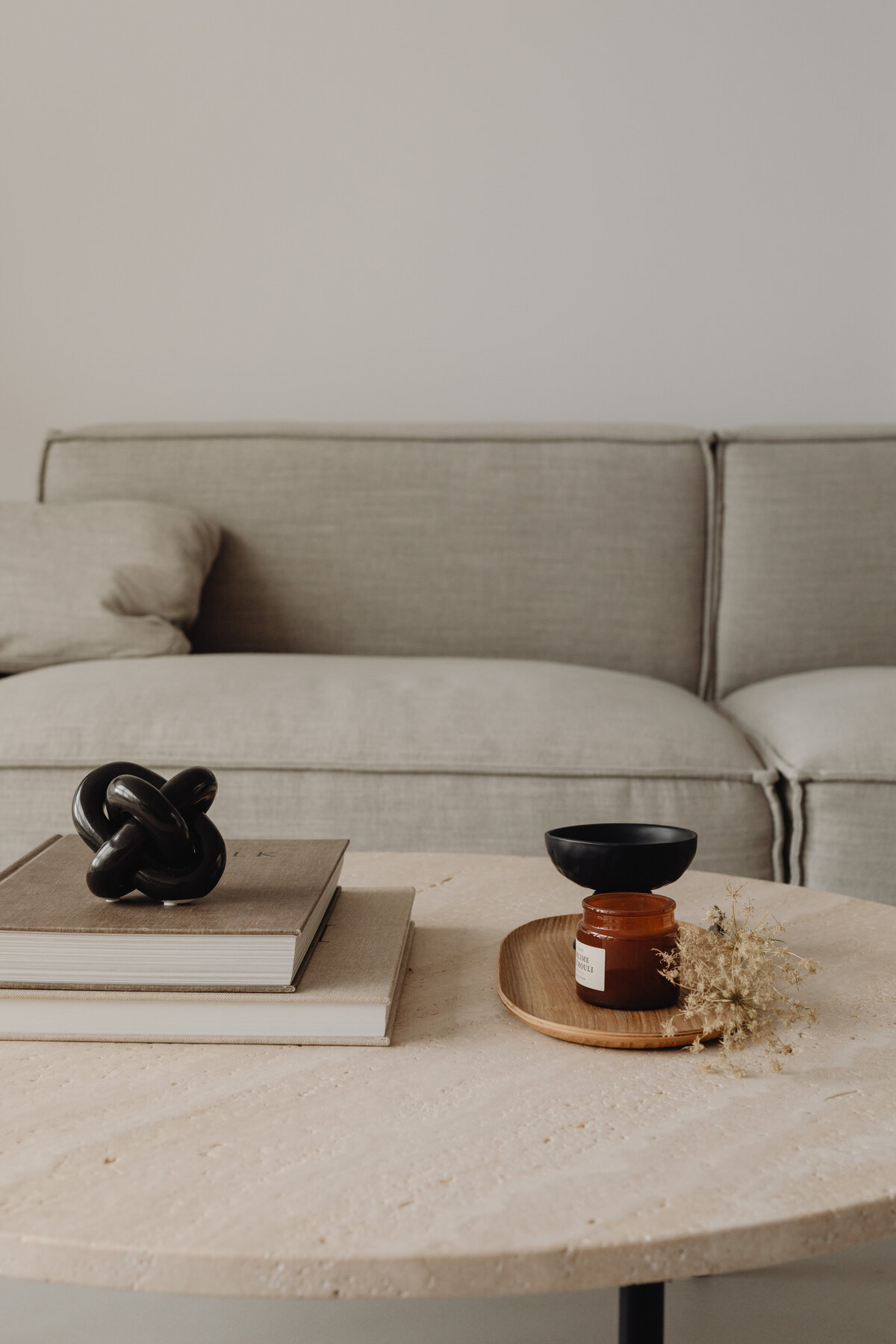 kaboompics_travertine-coffee-table-and-greige-linen-couch-28879