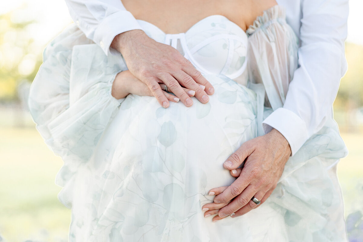 maternity-hands-on-belly-bluebonnets