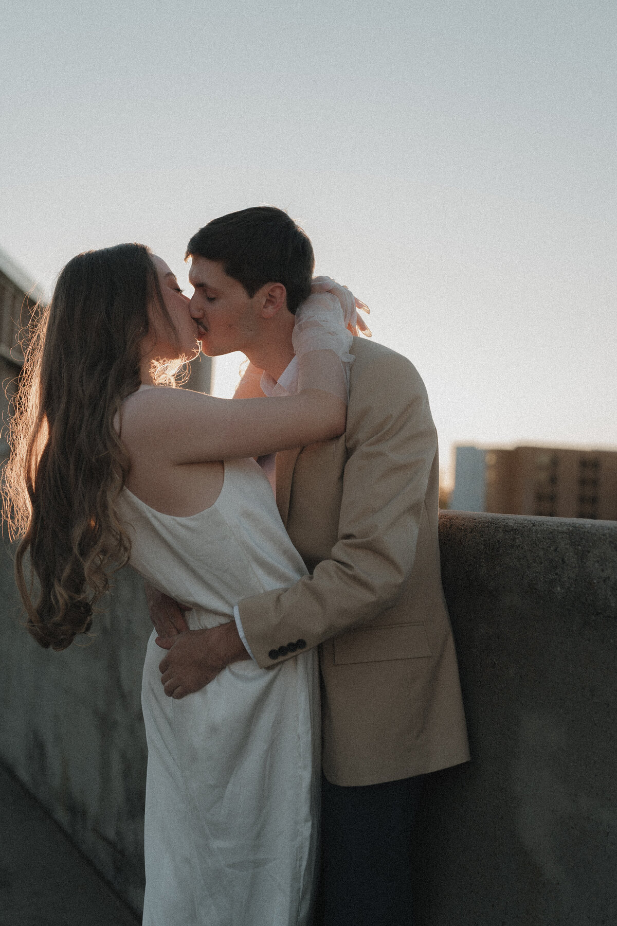 couple kissing in high point downtown