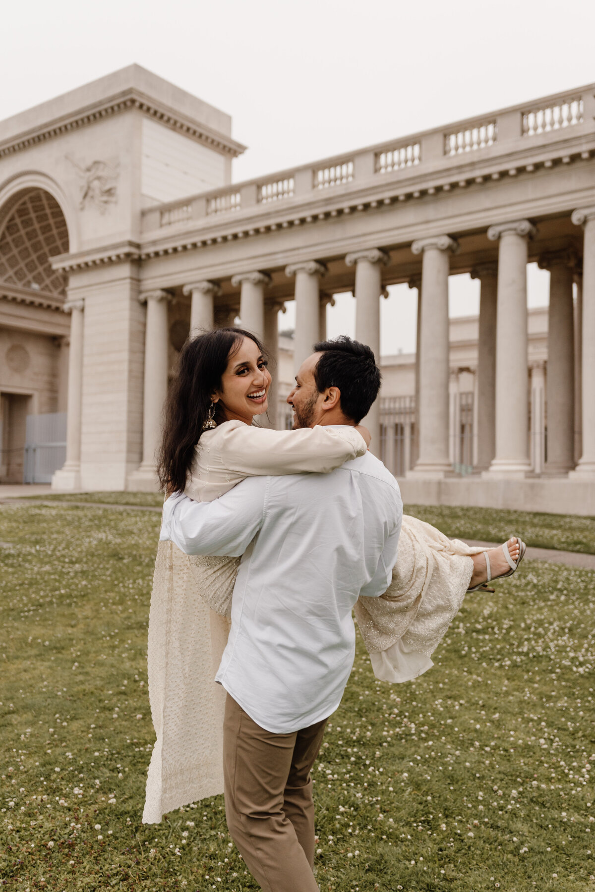 playful couple at legion of honor
