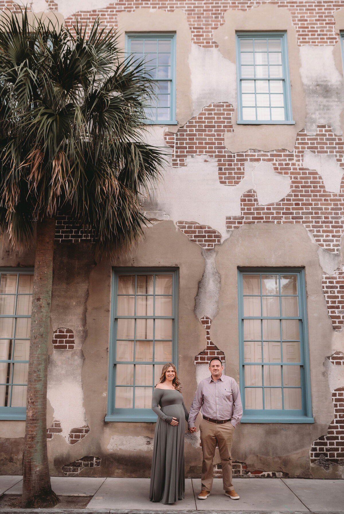 Expectant parents pose for Maternity Photos in Charleston.