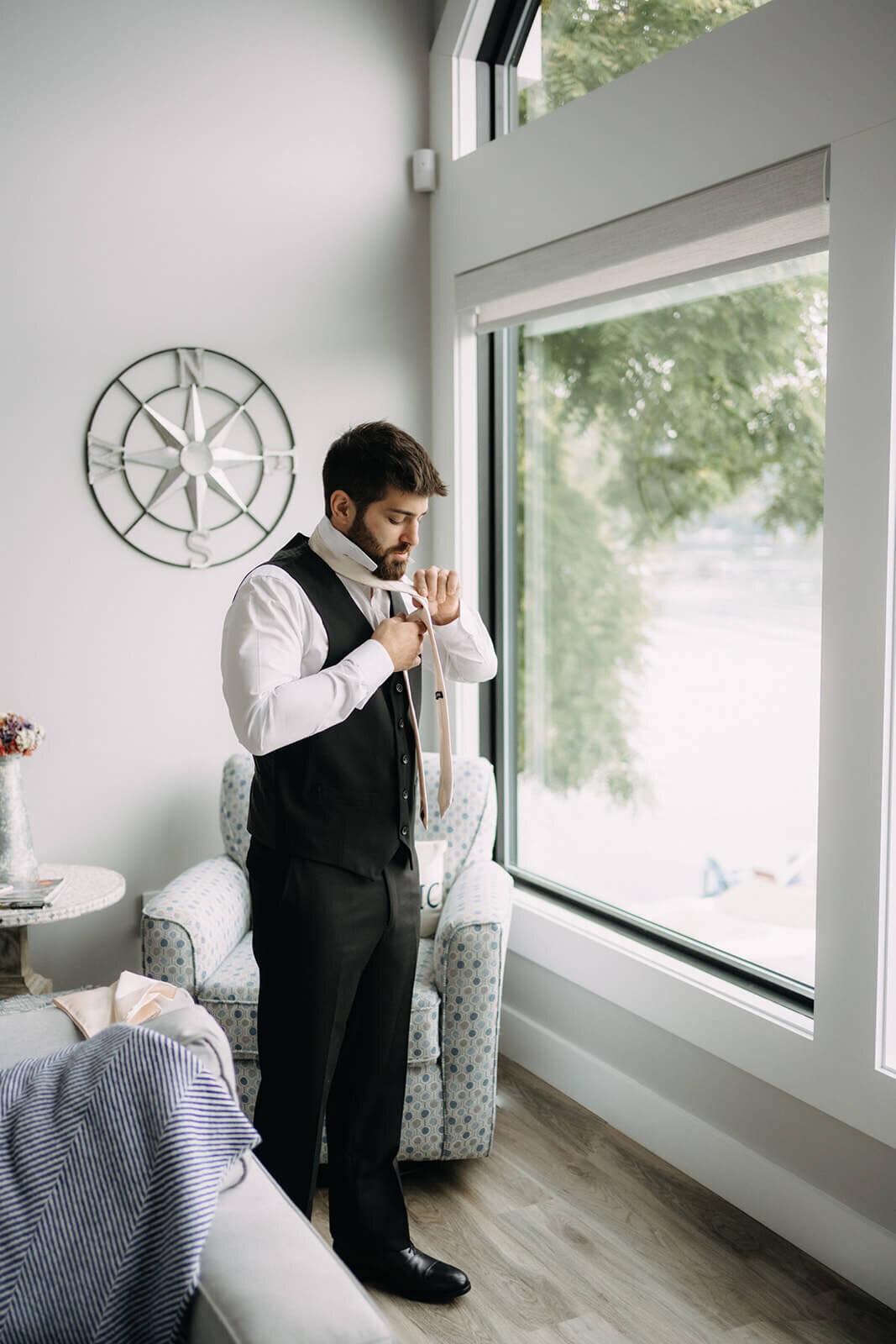 Groom getting ready for Finger Lakes wedding