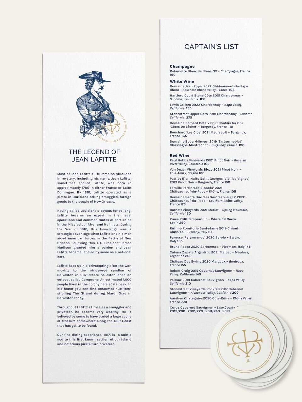 Custom wine menu and printed brand storytelling insert, designed as part of a refined restaurant brand system with custom monogram coasters.