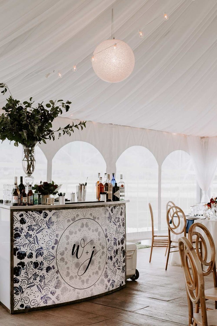 Bar set up in an event tent at a wedding in Colorado