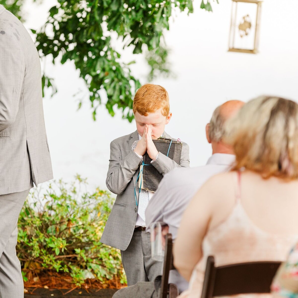 Ring bearer praying