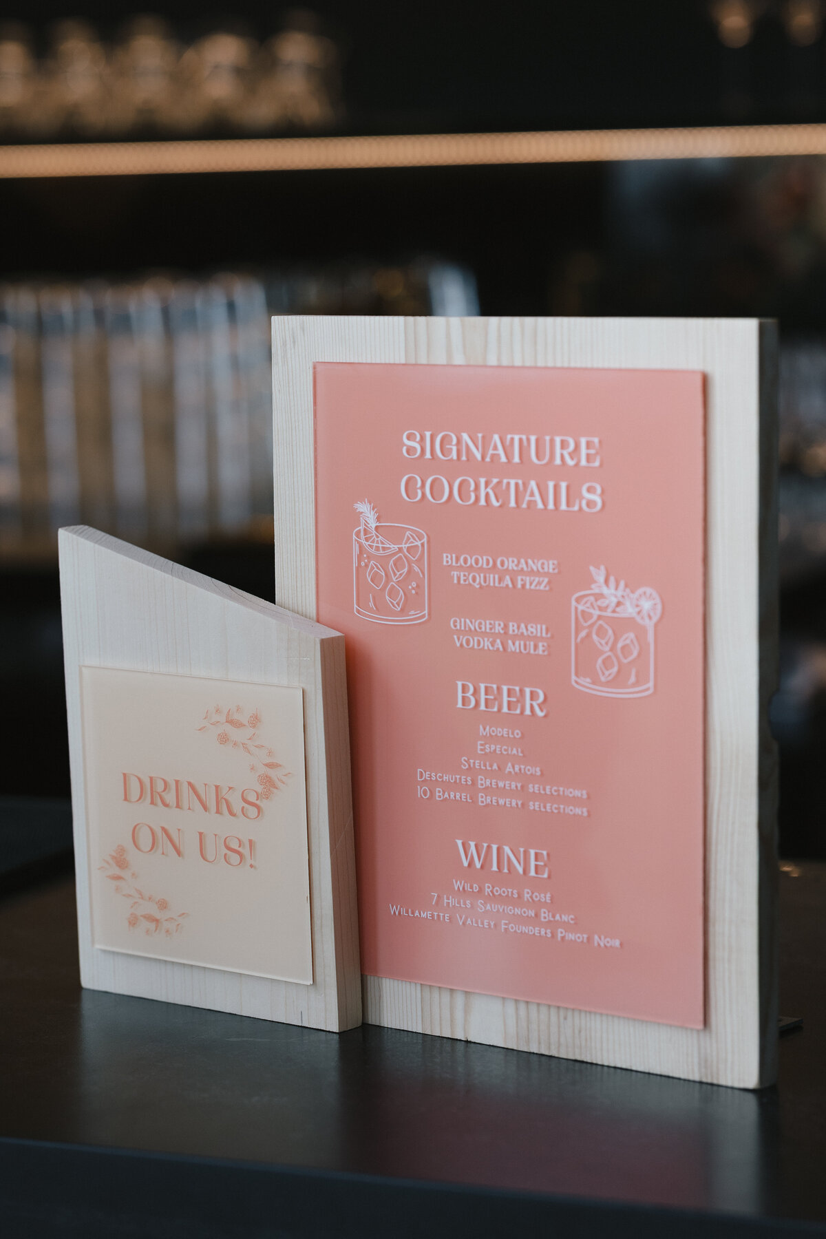 Wedding bar menus featuring light wood accents, berry details and coral and peach representing full service calligraphy and design by Life in Letters