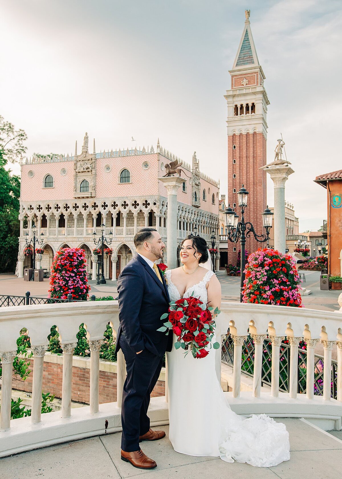 Newlywed couple posing on bridge in Italy Isola at Disney's Epcot