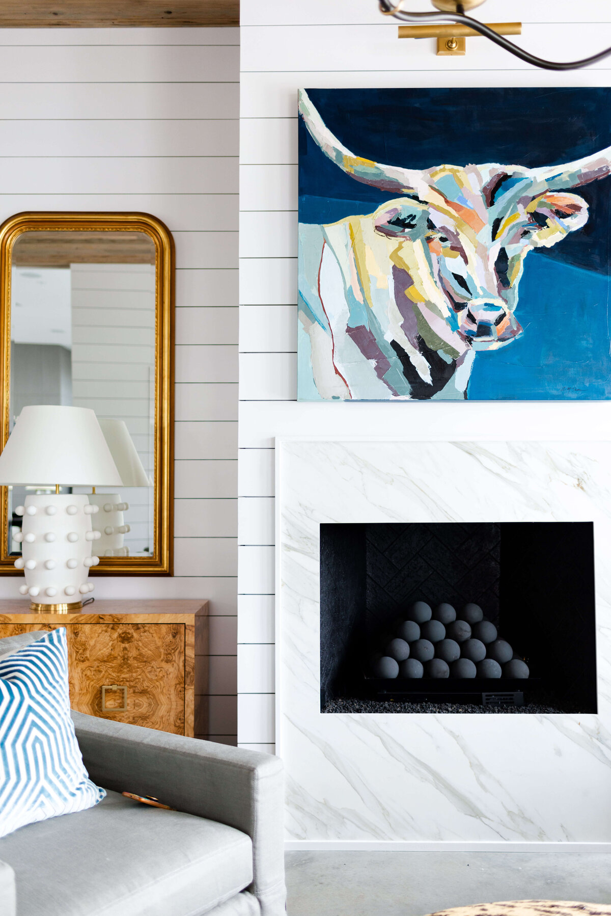 oyster creek studios building belt new build  yak painting and electric fireplace in living room
