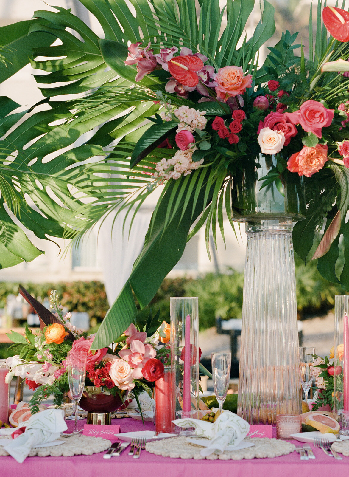 Kate-Murtaugh-Events-destination-wedding-planner-monstera-leaf-centerpiece-florals