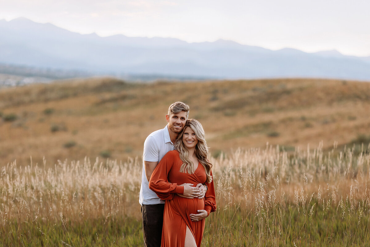 Denver outdoor maternity session with gorgeous couple and mountain backdrops