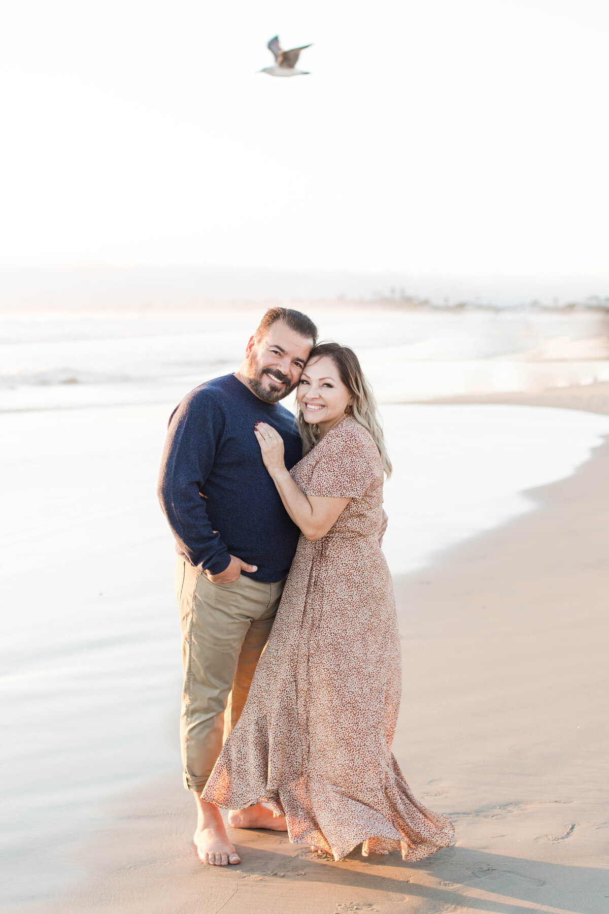 couple-hugging-during-san-diego-family-photography-coronado-beach