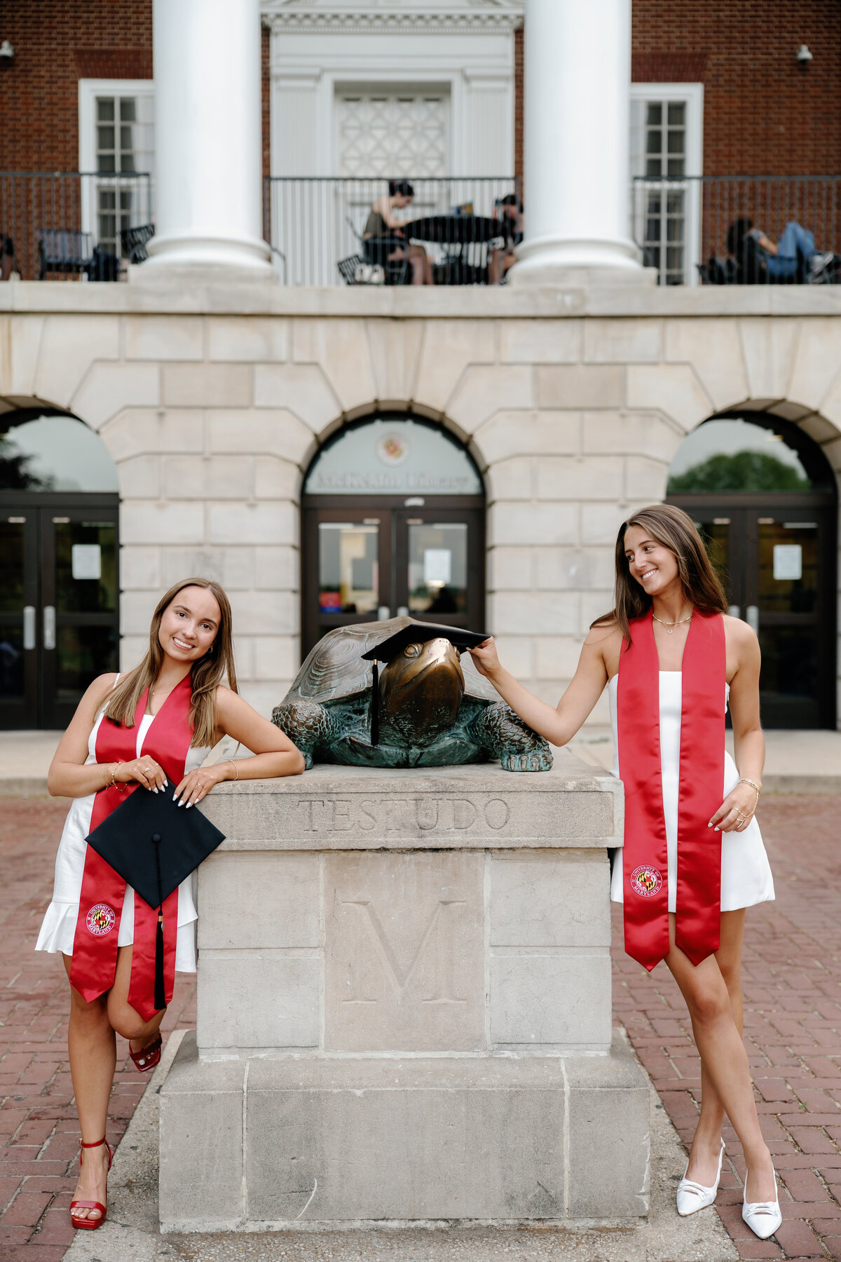 University of Maryland Graduates at McKeldin Mall with Testudo in College Park Maryland Captured by UMD Graduation Photographer Brenna Marie Photography