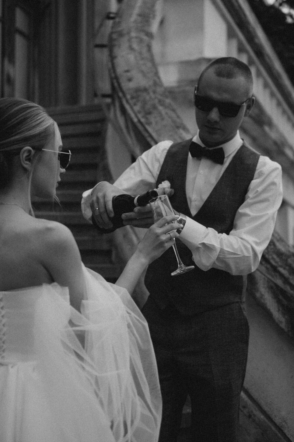 bride-and-groom-pouring-champagne