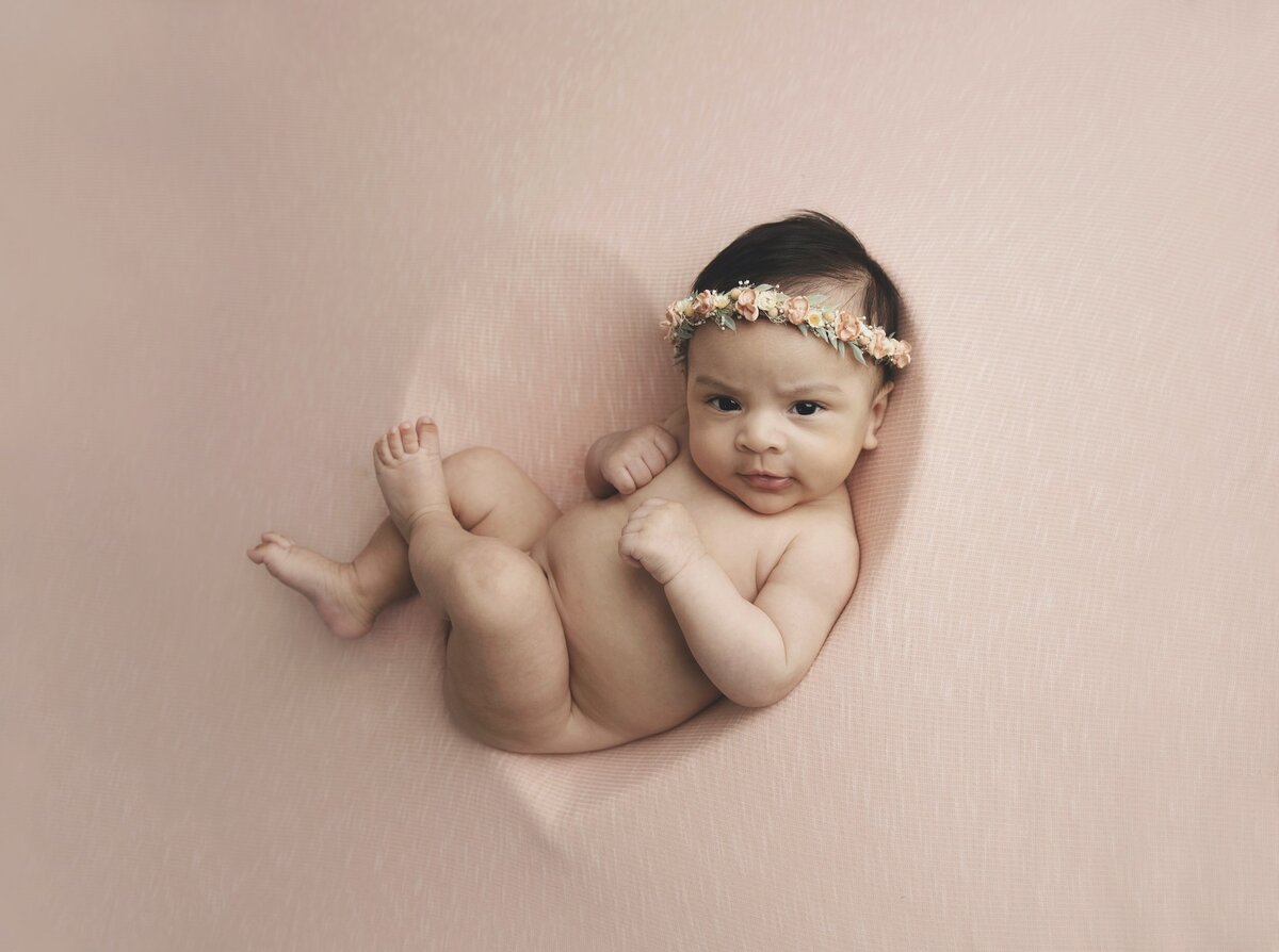 Baby girl pink background with floral crown
