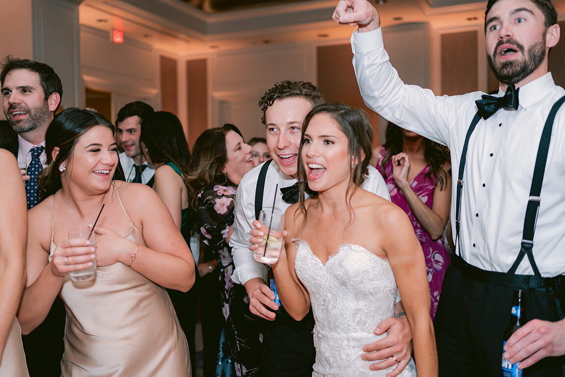 Wedding guests enjoying wedding reception at Hotel Crescent Court, Dallas