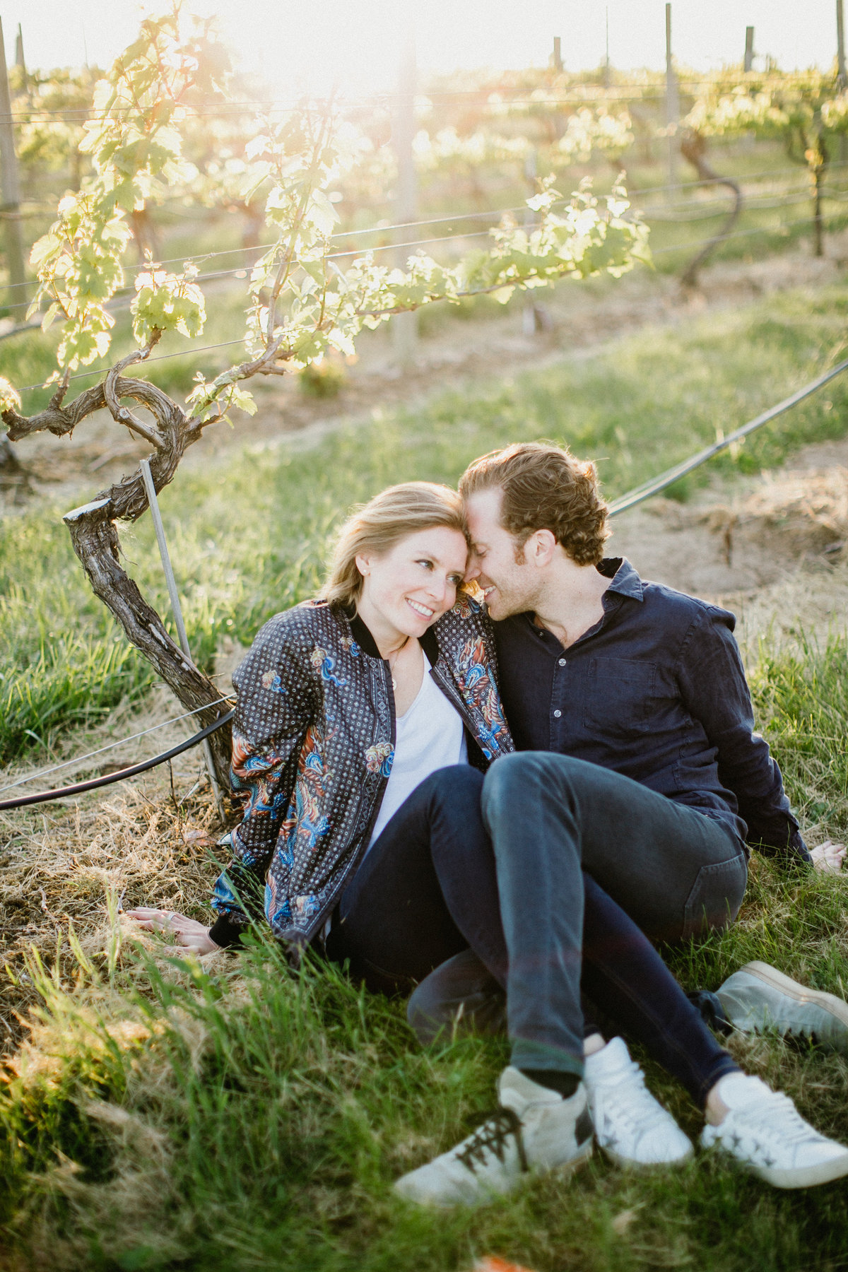Sunset engagement session at a winery location in New York,  photographed by Sweetwater.