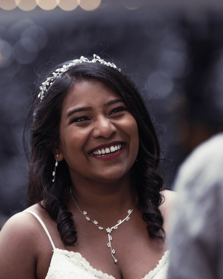 Smiling bride in reception picture