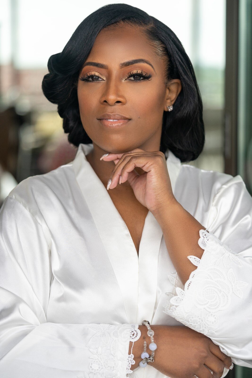 bride-glam-portrait-white-robe-alexander-hotel.jpg