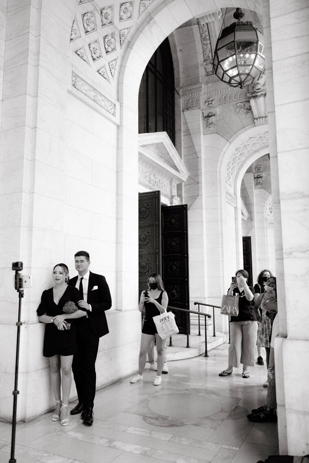 People are lining up at the New York Public Library's entrance. Image by Jenny Fu Studio