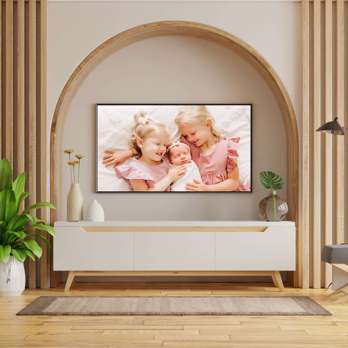 newborn photo in Springfield MO of siblings hugging baby sister