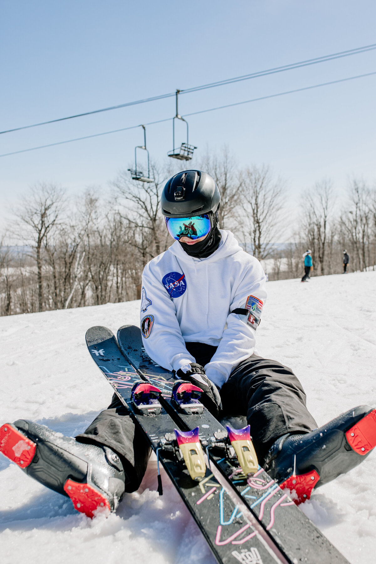 Creative winter senior pictures for downhill skiers.