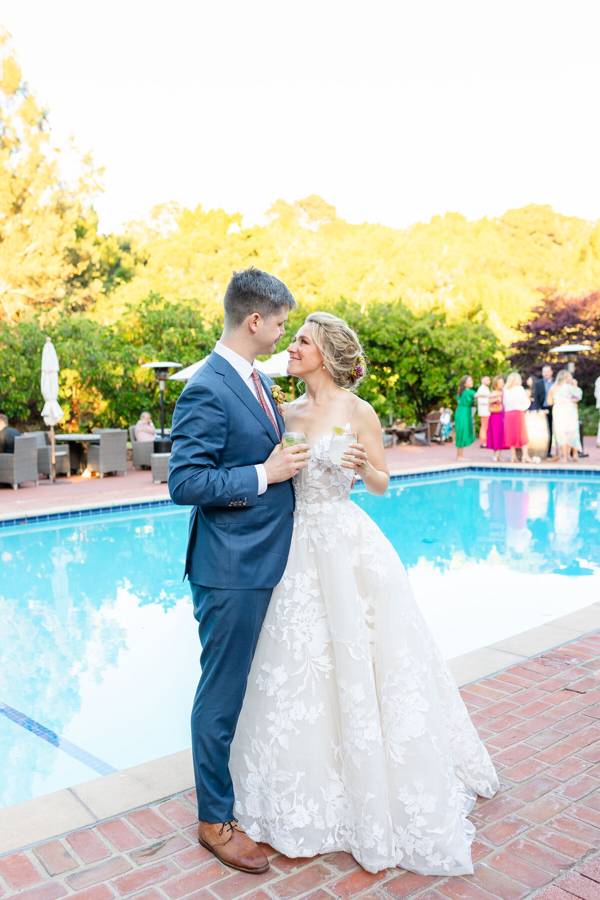 Beautiful couples moment by the pool side 