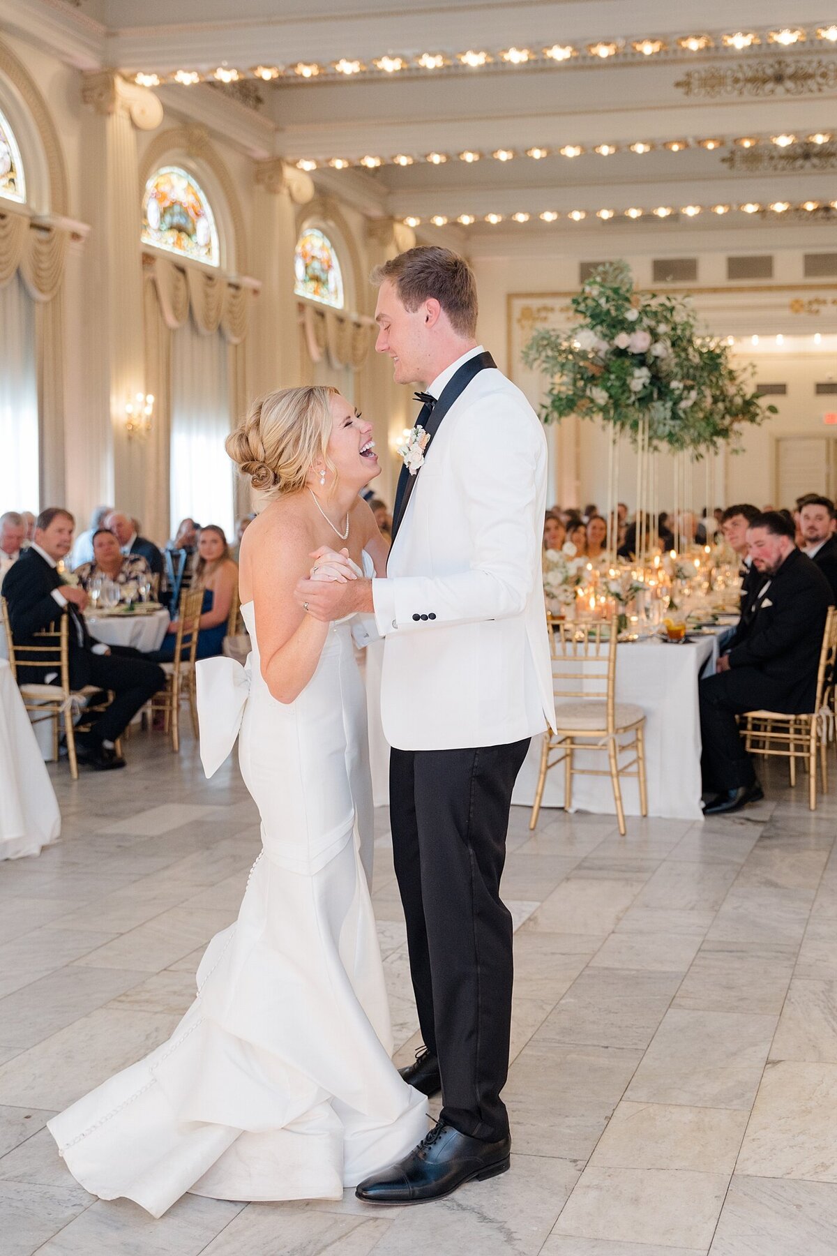 Columbus wedding  photographer captures bride and groom sharing their first dance together at the Westin