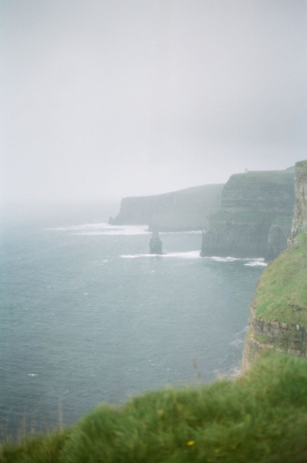 A photo of the cliffs of moher in ireland showing off the cliffs and the ocean below