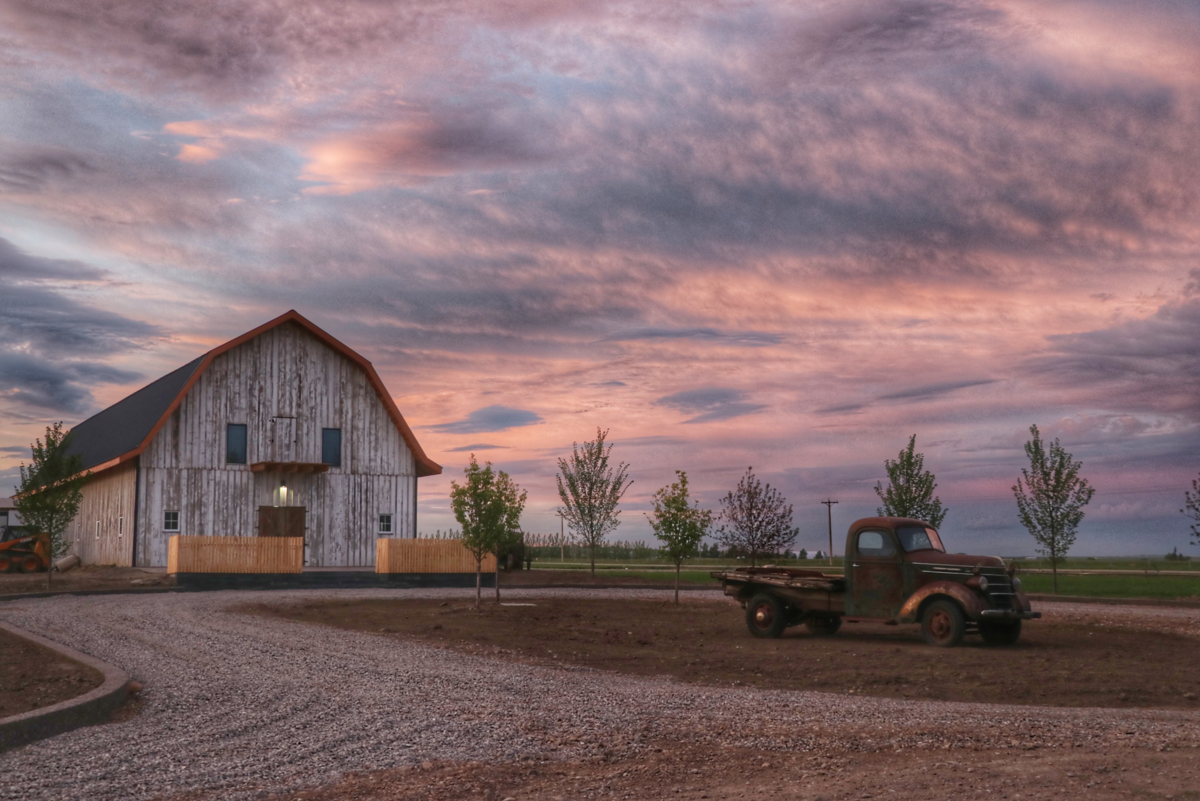 Beautiful sunset at Countryside Barn, rustic, country Lethbridge, Alberta wedding venue, featured on the Brontë Bride Vendor Guide.