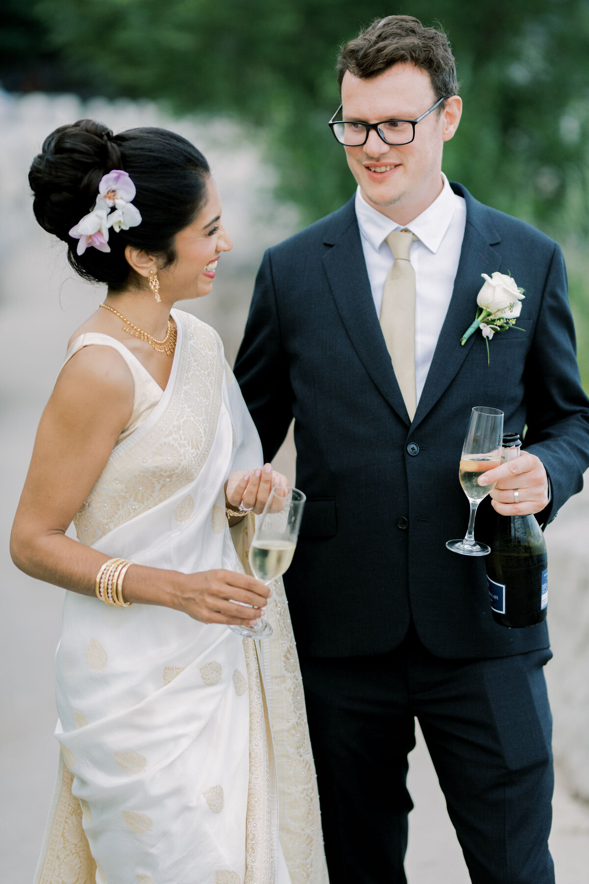bride and groom sharing a moment together outside near lake Ontario