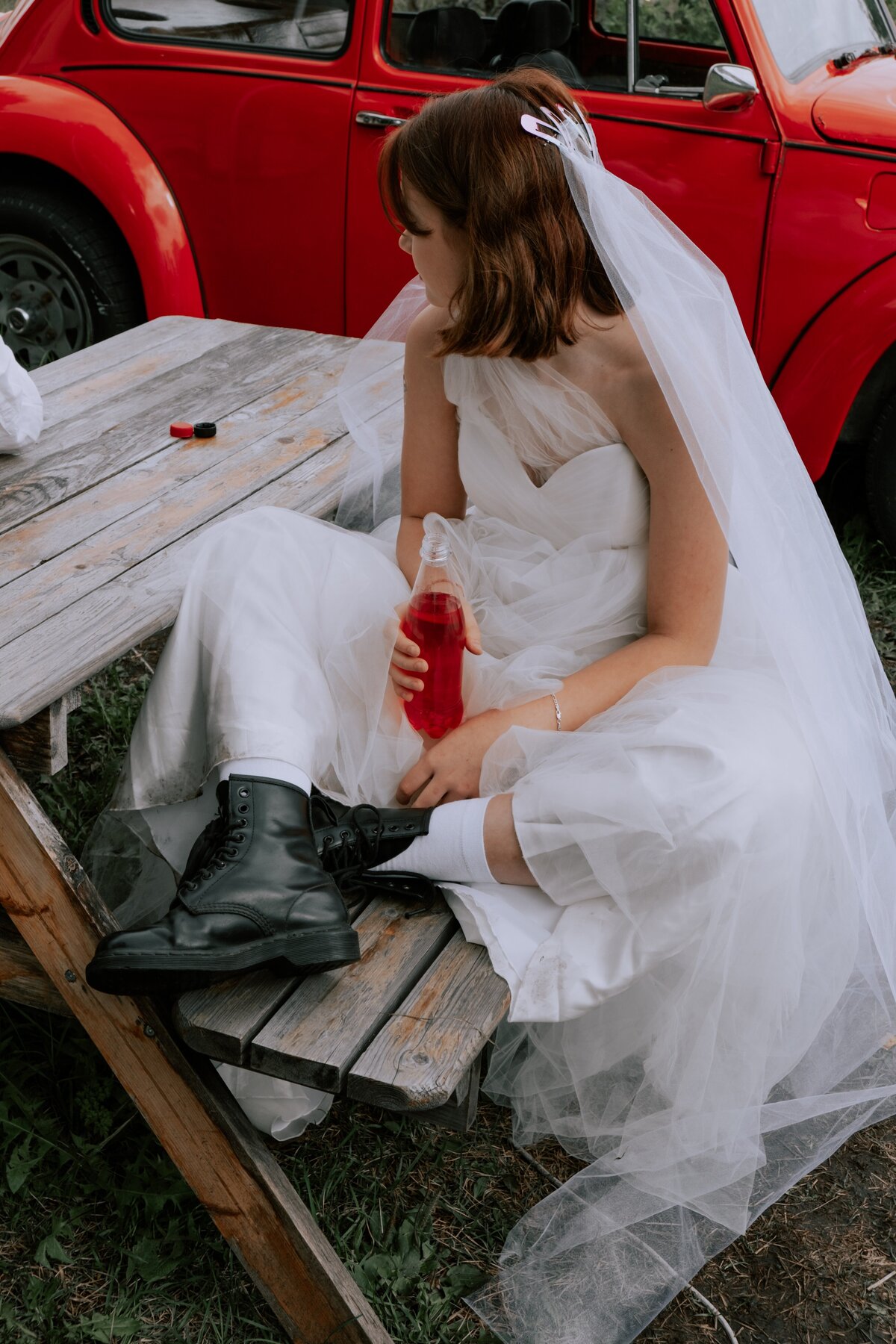 Bride relaxing with a soda on her Wedding day