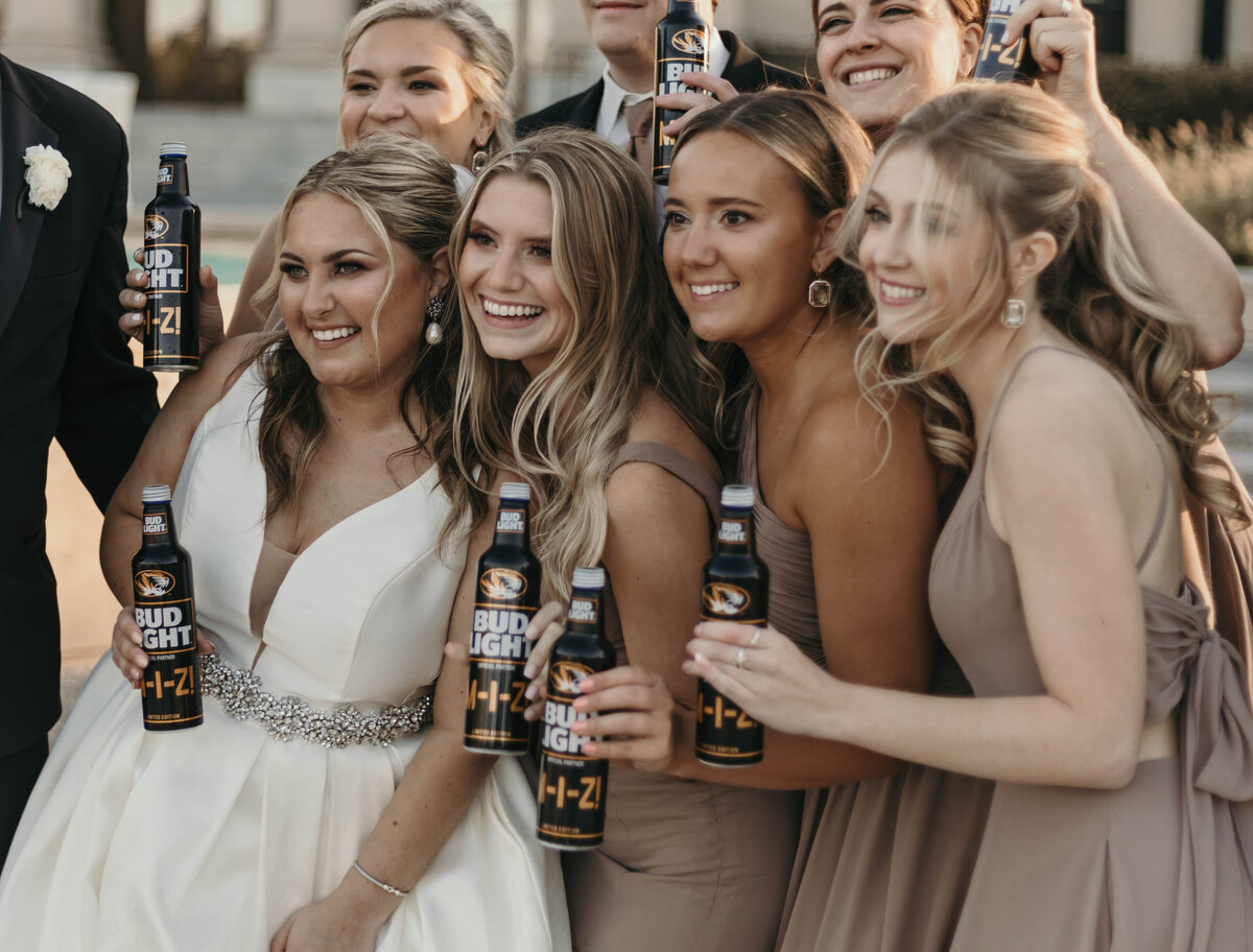 bride and bridesmaids with college beers