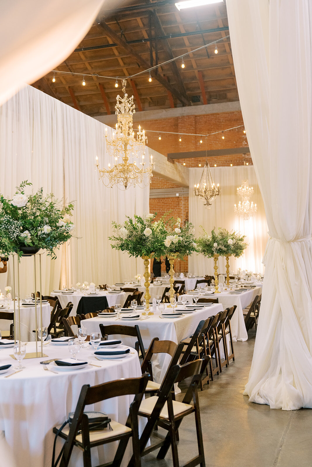 centerpieces at willow ballroom - tall centerpieces white and green textures