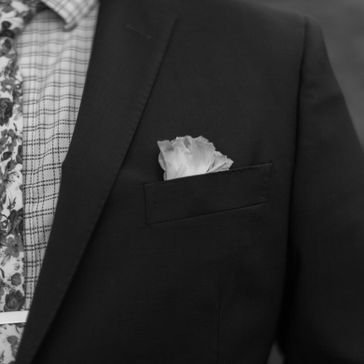 Detail photo of grooms suit
