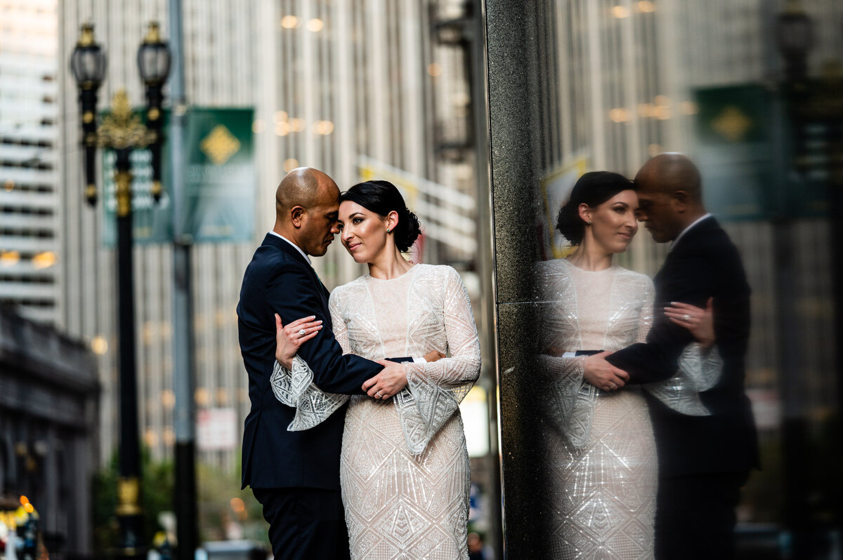 San Francisco wedding photographer documents creative urban portrait with reflection on downtown city stree