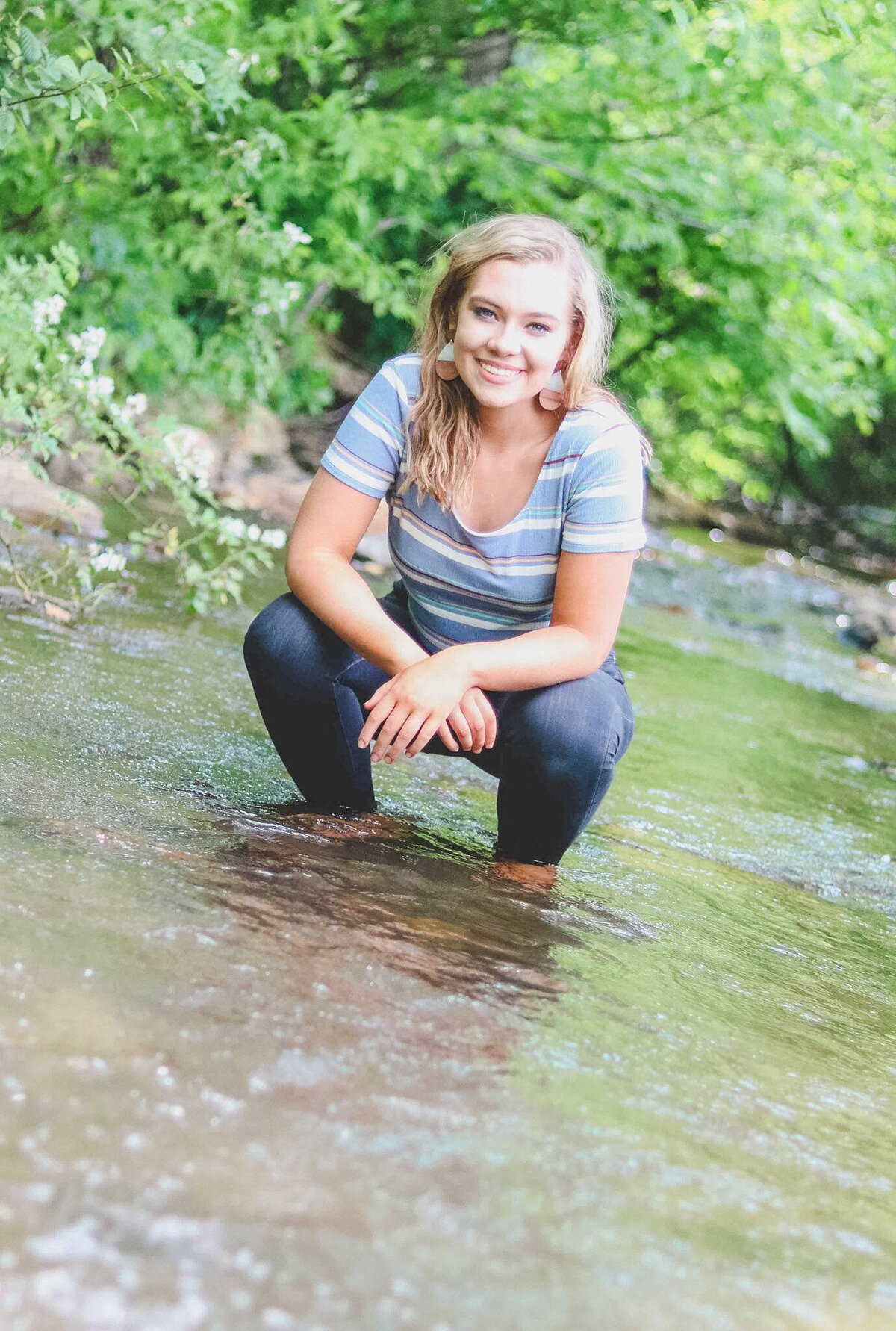 Senior girl in a creek