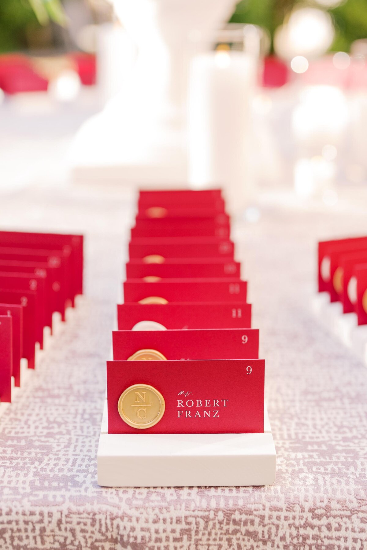 red-place-cards-gold-wax-seal