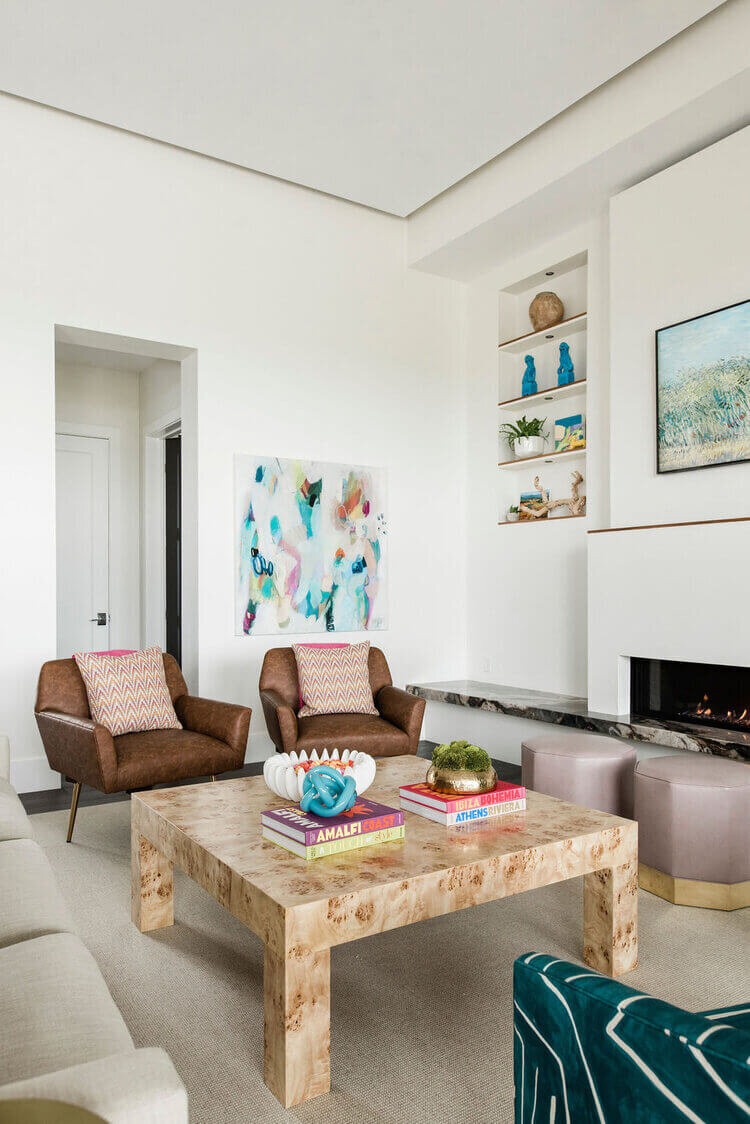 oyster creek studios austin barton creek brown leather seats surrounding a wooden coffee table in living room