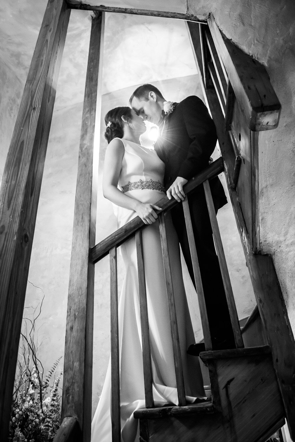 Bride and groom on old stairs at Latrobe's
