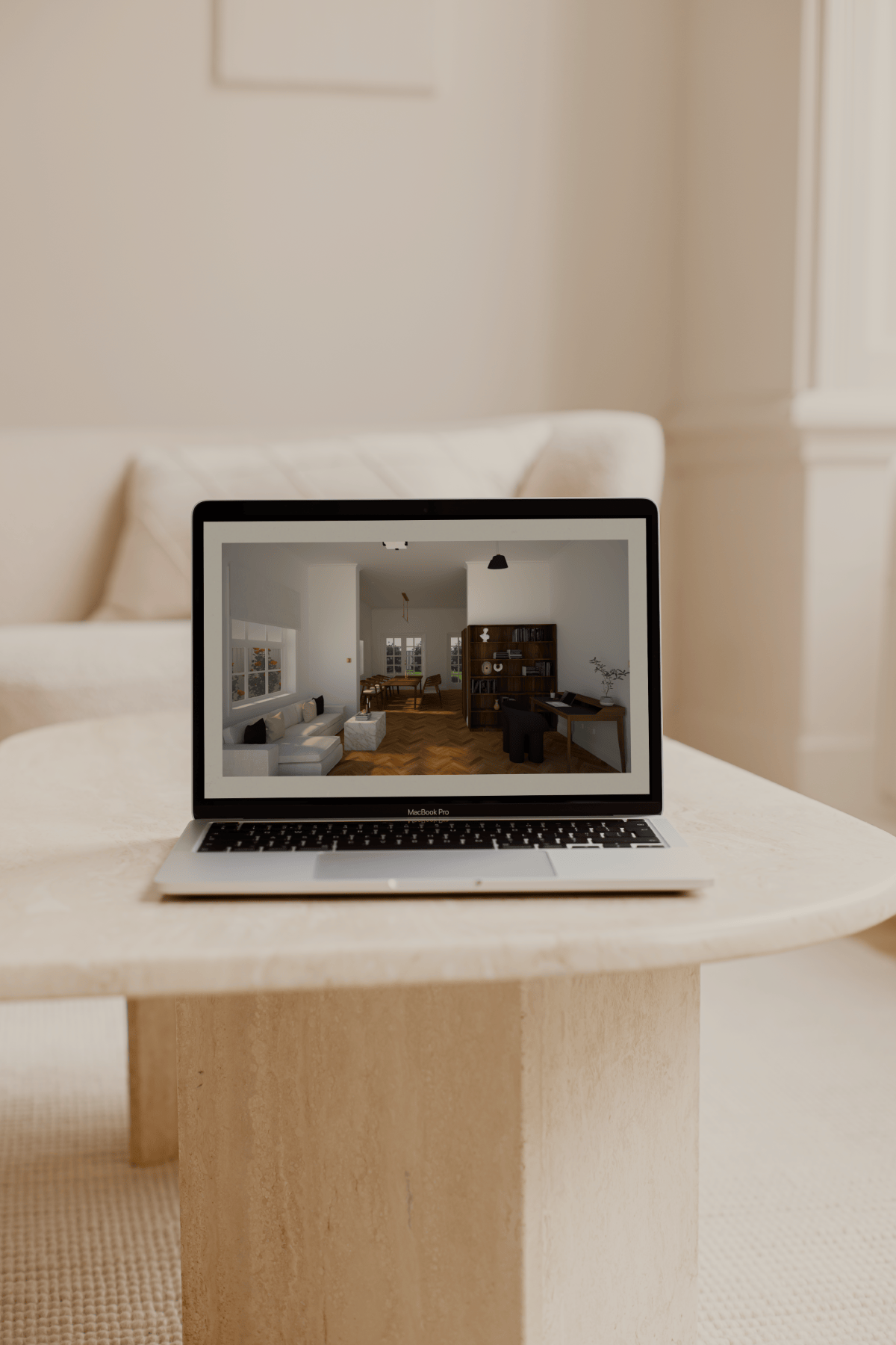 Laptop on a travertine coffee table on a cream rug, with a white sofa in the background, displaying a photorealistic render of an informal living and study area in a heritage home.